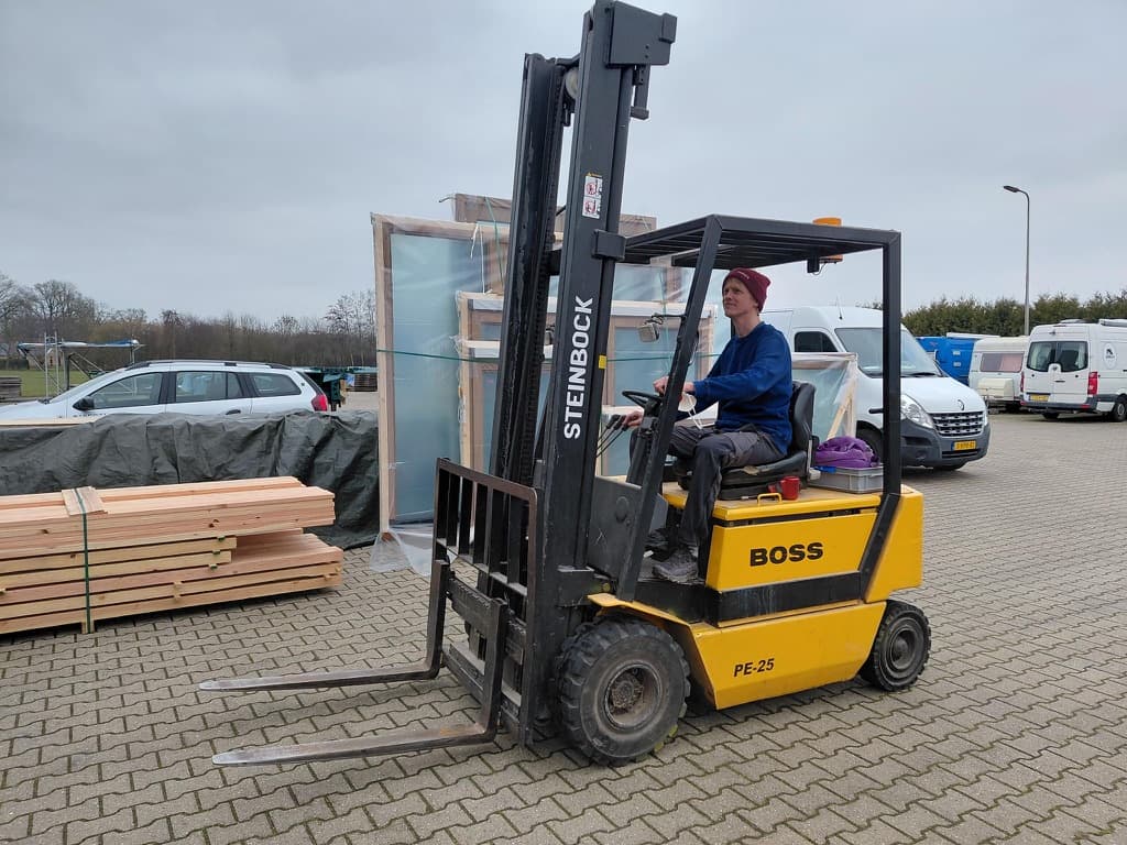 Me sitting on a forklift